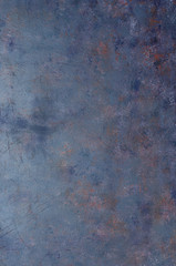 Navy blue rusty metal background.