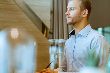smart casual businessman in shirt liftstyle woking in office