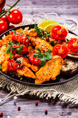 Roasted meat, groats and vegetables