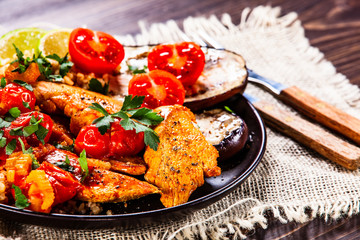 Roasted meat, groats and vegetables