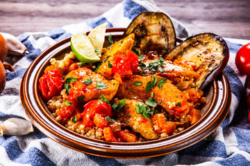 Roasted meat, groats and vegetables