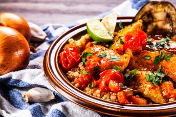 Roasted meat, groats and vegetables