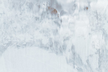 Obraz na płótnie Canvas Frosty patterns on a frozen ice box in the early morning