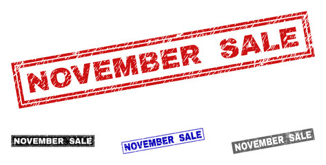 Grunge NOVEMBER SALE rectangle stamp seals isolated on a white background. Rectangular seals with distress texture in red, blue, black and grey colors.