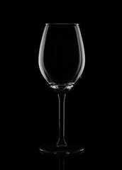 empty wine glass on a black background. silhouette of a glass. cogncept