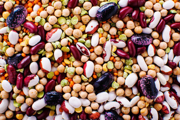 legume abstract - top view of a variety of colorful bean, lentil and pea