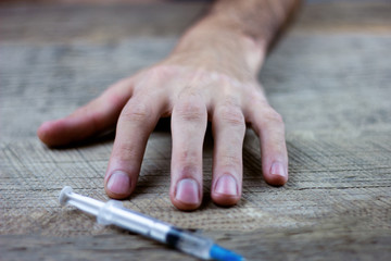 drug addict holding a syringe