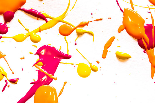 Orange Yellow and Pink Spant Splatters on White Background
