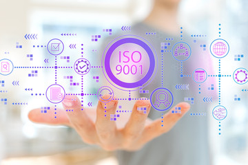 ISO 9001 with young man holding his hand