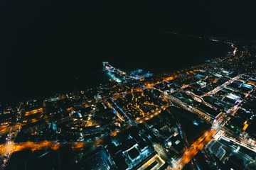 Aerial view of the Santa Monica shoreline, amusment park and pier at night