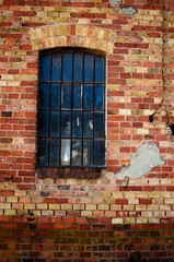 Fototapeta na wymiar old window in brick wall