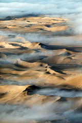 Fog over the sand sea of Sossusvlei, Namibia.