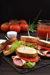 sandwich with meat  and tomatoes and herbs