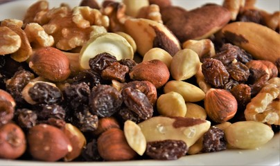 different peeled nuts and raisins closeup