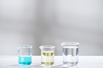 doctor woman scientist making herbal medicine in lab with herb leaves vitamin supplements mineral alternative treatment research.