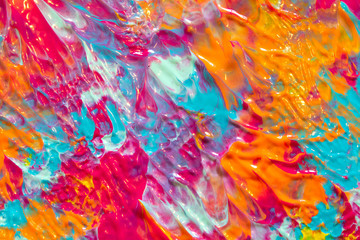 Pink Blue and Orange Paint Splatters on White Background