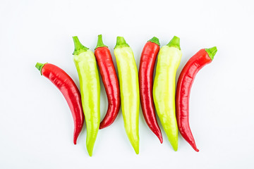 Fresh peppers on white background
