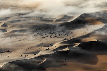 Fog over the sand sea of Sossusvlei, Namibia.