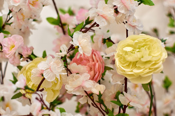 Spring pink plastic sakura flower decorating a garden