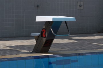 Image of swimming pool with starting blocks.