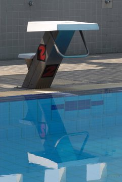 Image of swimming pool with starting blocks.