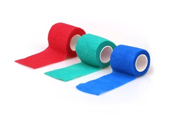 Elastic bandages to fix the dressing on the wound. Isolated on white background