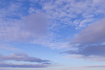 white clouds in the blue spring sky