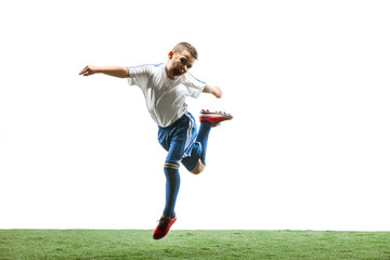 Professional football soccer player with ball isolated on white studio background