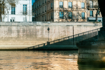 Parisian bridge and building seen from the Seine