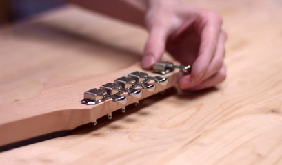 High quality guitar neck is built by luthier