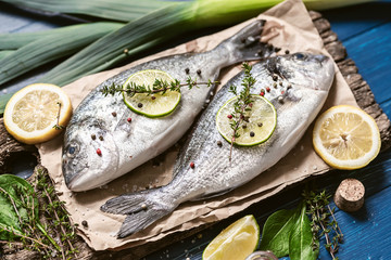 fresh raw dorado fish with spices. dinner for two with your loved one with your own hands.