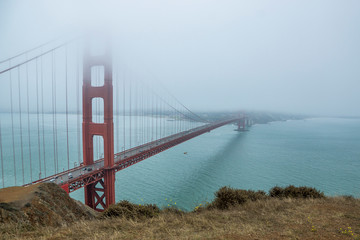 Golden Gate Bridge in San Francisco From the Marin Headlands in partial fog