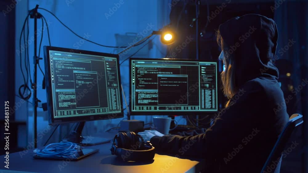 Poster cybercrime, hacking and technology concept - female hacker in dark room creating code or using compu