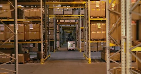 Workflow in a warehouse, active work in a warehouse, forklifts in a warehouse