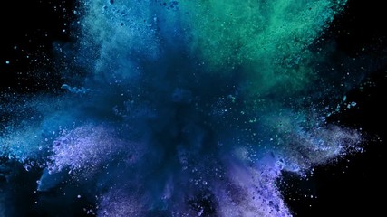 Super slowmotion shot of color powder explosion isolated on black background. Shot with high speed cinema camera at 1000fps