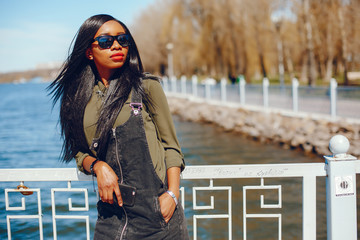 fashionable black girl in a park