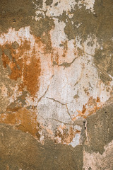 Cracked and peeling paint old wall background.