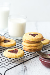Heart shaped Valentines Day cookies with jam. Shaped biscuit cookie.