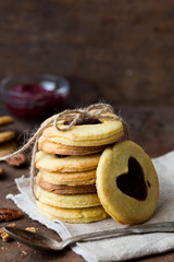 Heart shaped Valentines Day cookies with jam. Shaped biscuit cookie.