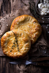 Khachapuri traditional Georgian cheese and egg-filled bread