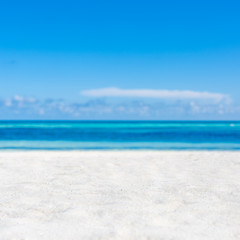 Simplicity and minimalism beach concept. White sand and blue sky, empty idyllic exotic beach landscape 