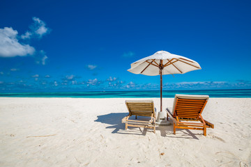 Tranquil beach scene. Exotic tropical beach resort, landscape for background or wallpaper. Design of summer vacation holiday concept.