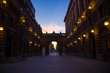 Fototapeta na wymiar Courtyard between arche of Parliament House Riksdag, Stockholm, Sweden