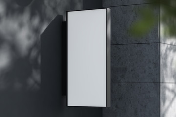 Rectangular mock up sign on building facade