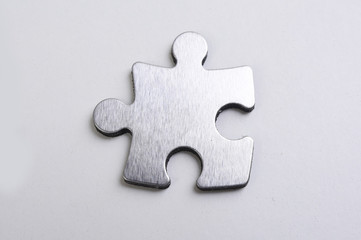 metal puzzle on a white background