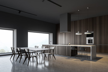 Dark wooden kitchen corner with dining table