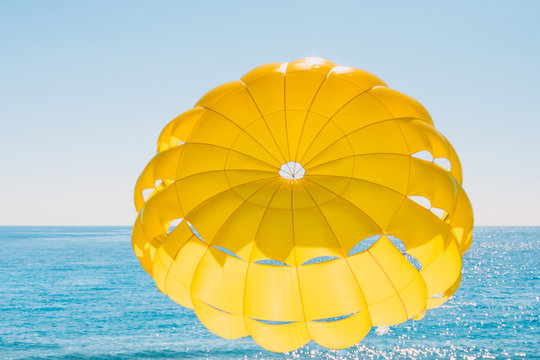 Seasonal attraction for tourists on the beach - parasailing boat trips
