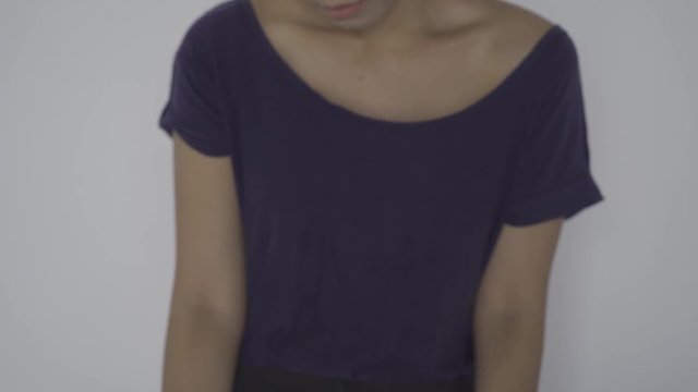 Young anorexic woman showing a text of Help. Shot in 4k resolution