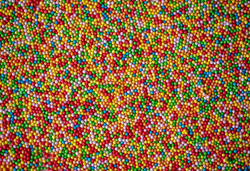 Hundreds and thousands candy colored background