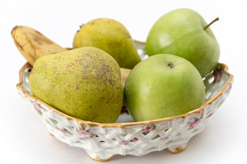 fruit on a platter: apples, pears and banana